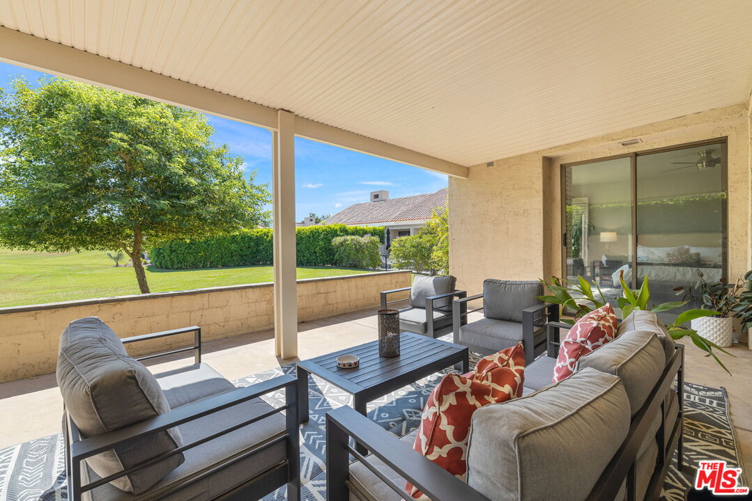 155 Desert W Drive Rancho Mirage, CA 92270 - Photo 39 of 50 a outdoor living space with furniture