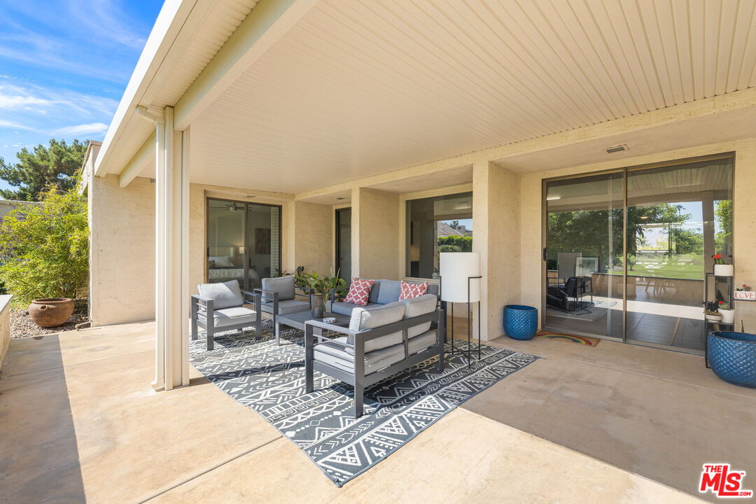 155 Desert W Drive Rancho Mirage, CA 92270 - Photo 44 of 50 a living room with furniture