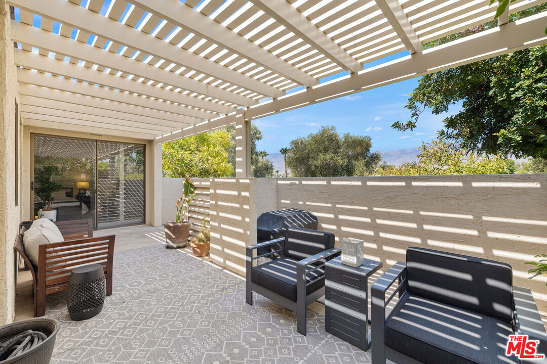 155 Desert W Drive Rancho Mirage, CA 92270 - Photo 5 of 50 a roof deck with couch and chairs