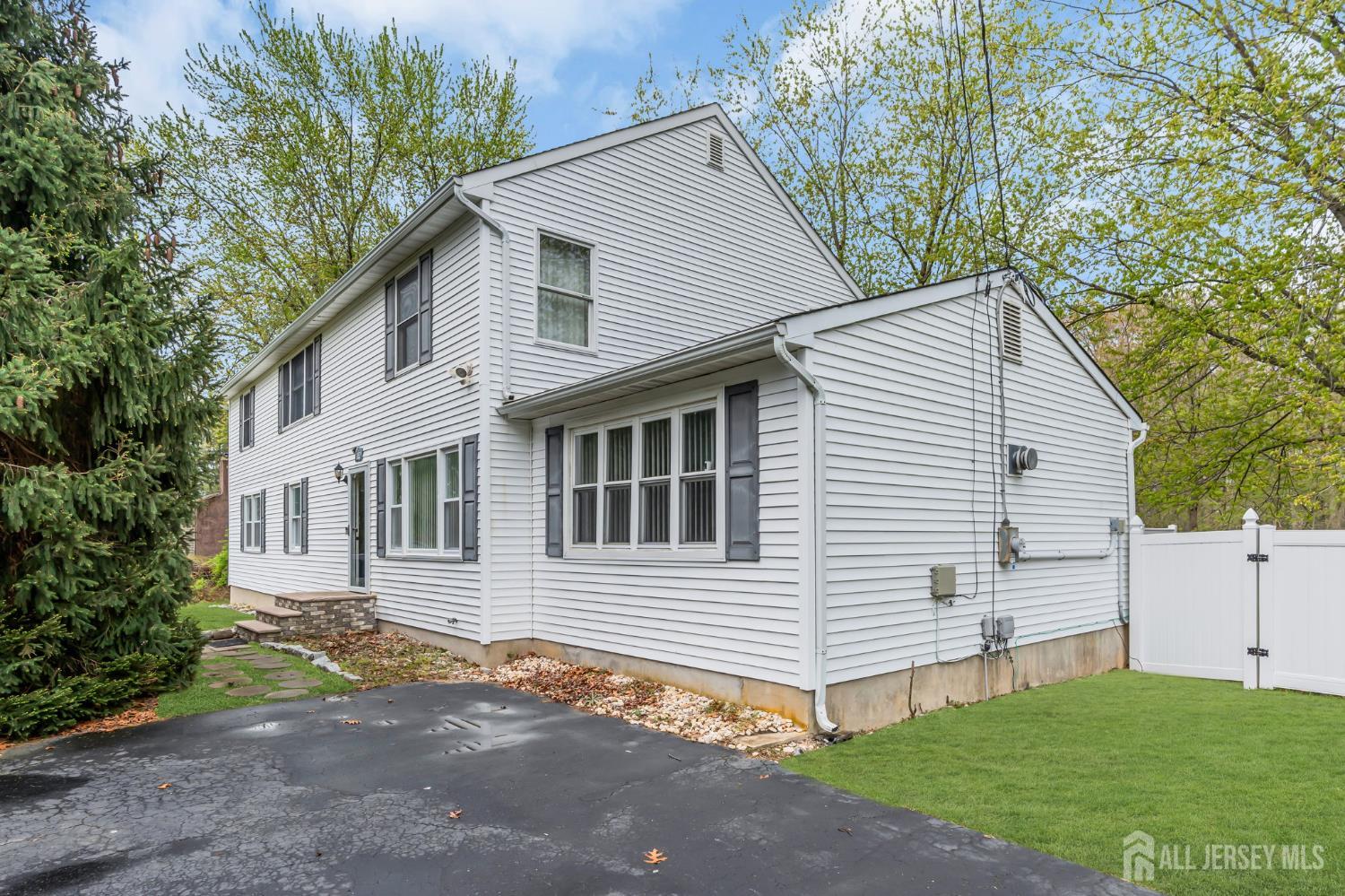 120 Cedar Swamp Road Jackson, NJ 08527 - Photo 2 of 39 a view of a house with a yard