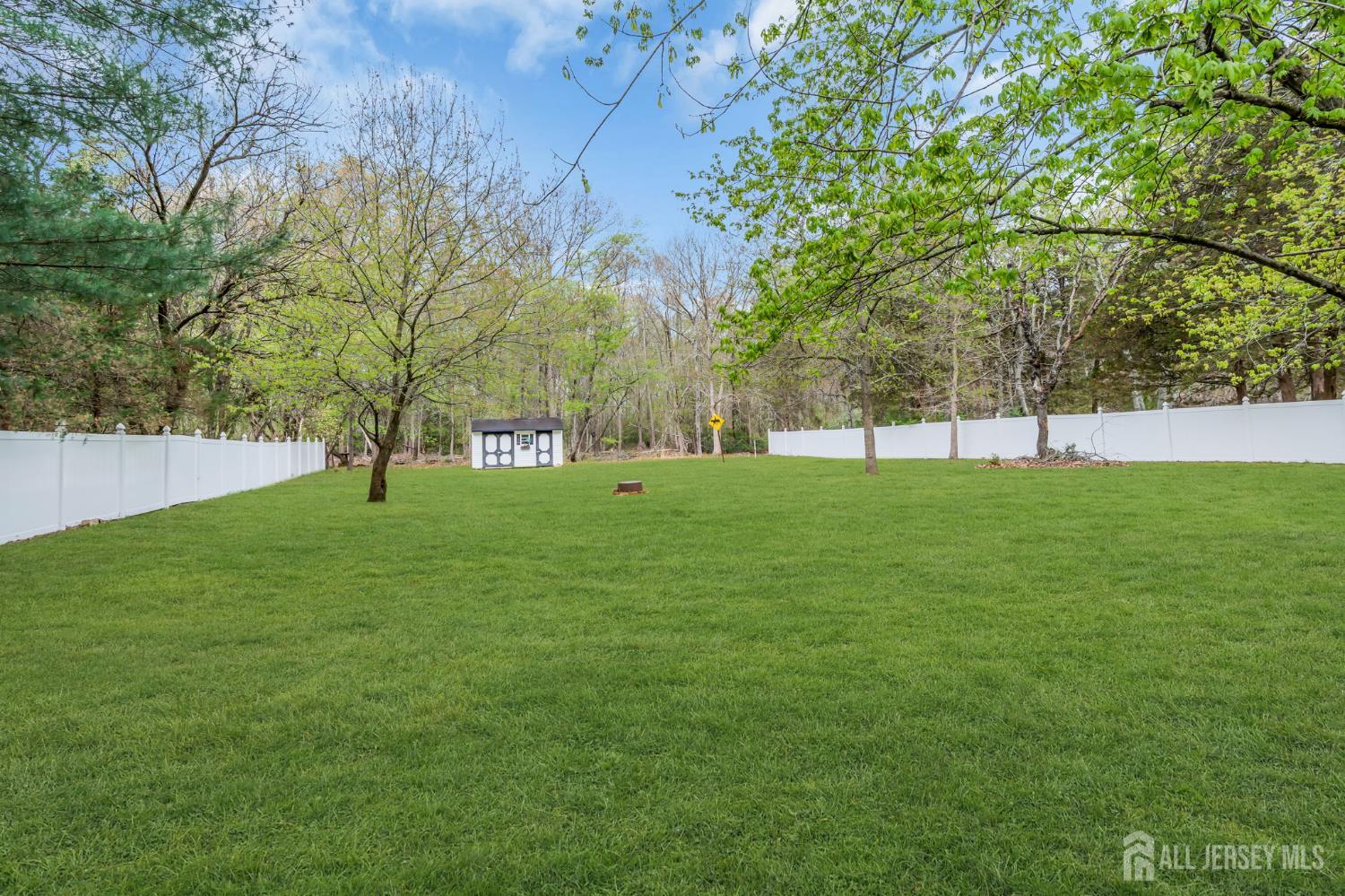 120 Cedar Swamp Road Jackson, NJ 08527 - Photo 26 of 39 a view of field with grass and trees