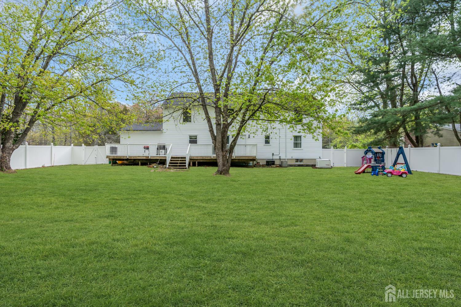 120 Cedar Swamp Road Jackson, NJ 08527 - Photo 27 of 39 a view of a house with backyard
