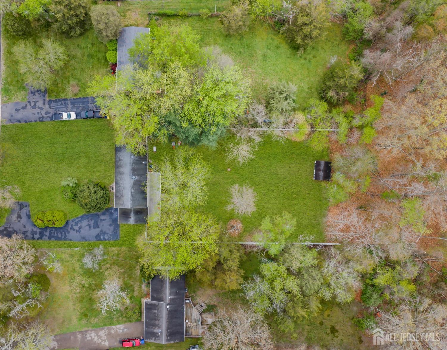 120 Cedar Swamp Road Jackson, NJ 08527 - Photo 39 of 39 a view of a garden with plants