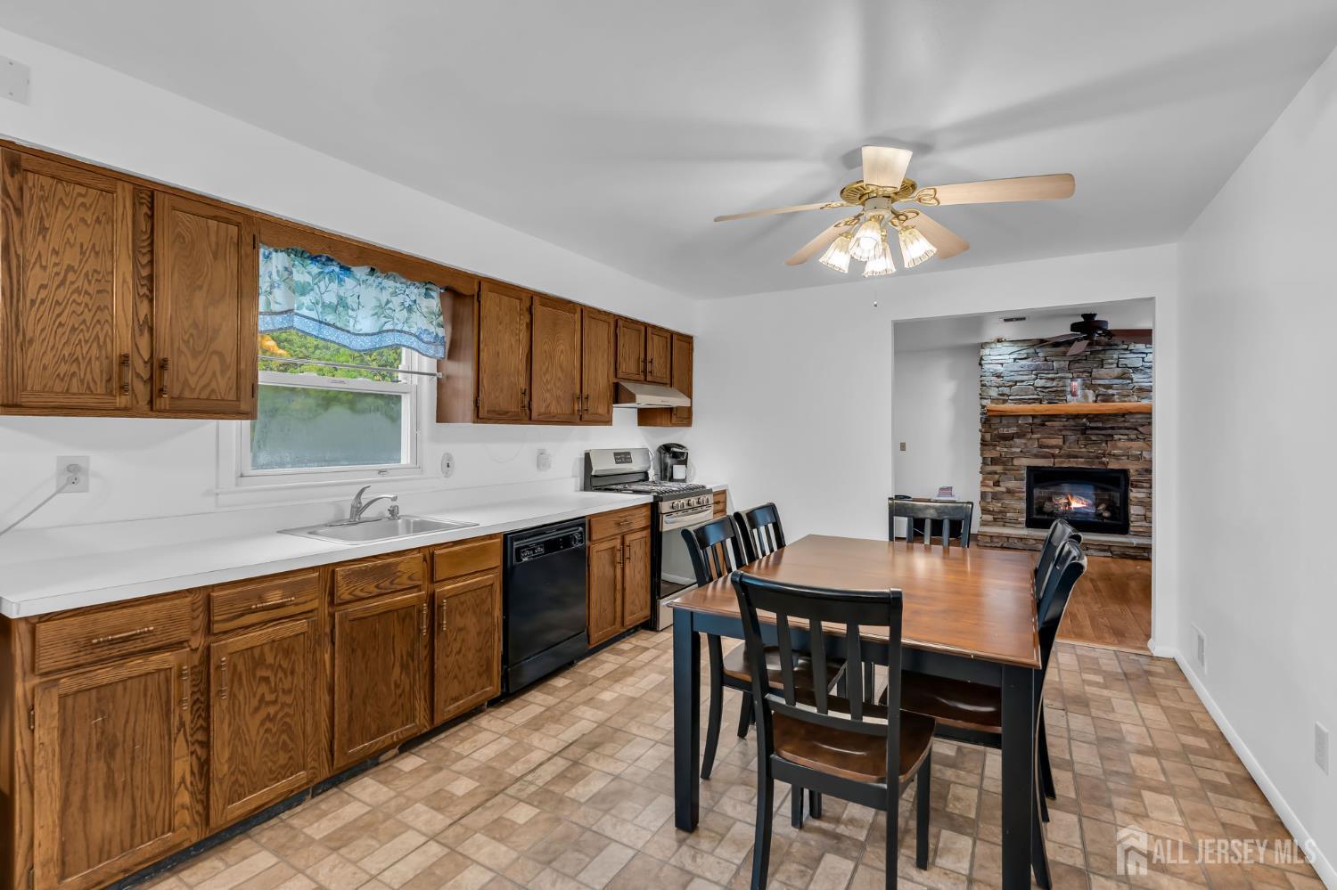 120 Cedar Swamp Road Jackson, NJ 08527 - Photo 6 of 39 a view of a dining room with furniture window and wooden floor