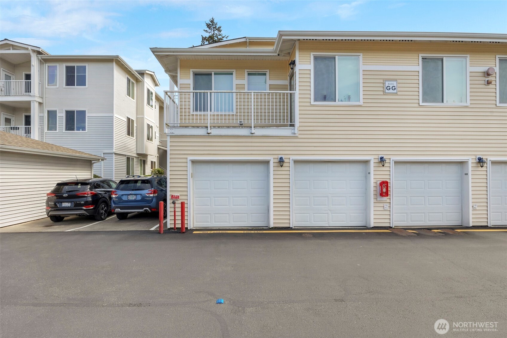 14915 38th Drive Southeast, Unit 3025 Bothell, WA 98012 - Photo 25 of 35 a view of a car park in front of house