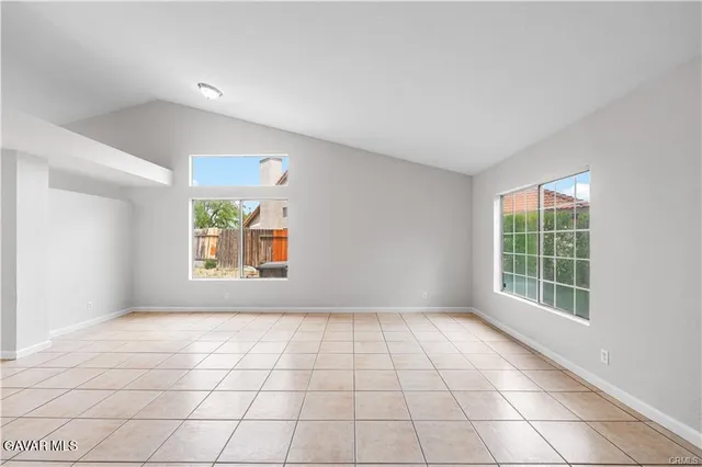 a view of an empty room and window