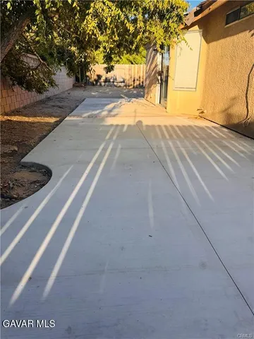 a view of yard along with trees