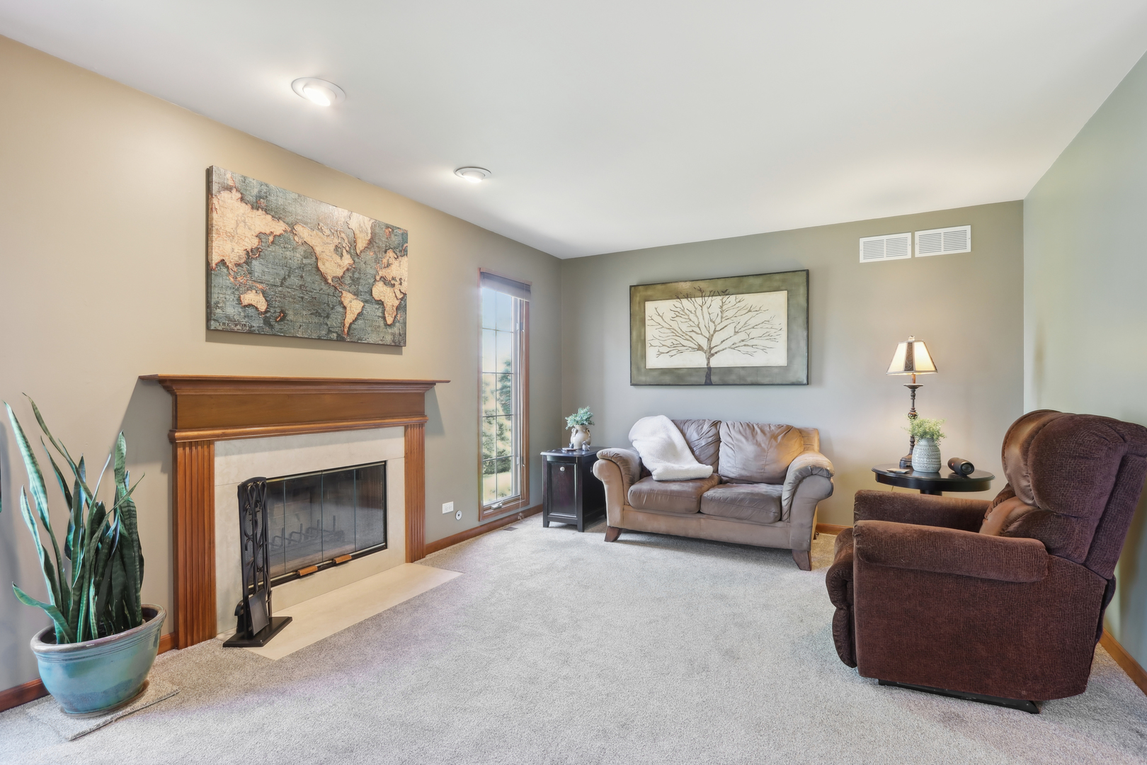 2835 Randall Ridge Court Elgin, IL 60124 - Photo 13 of 39 a living room with furniture and a fireplace