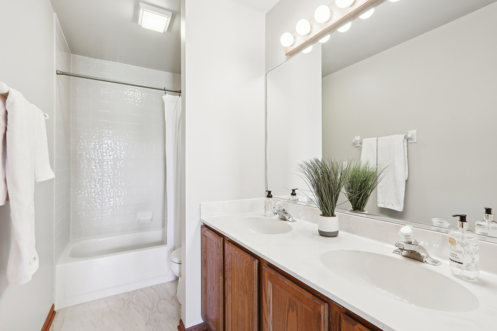 2835 Randall Ridge Court Elgin, IL 60124 - Photo 24 of 39 a bathroom with a sink and a mirror