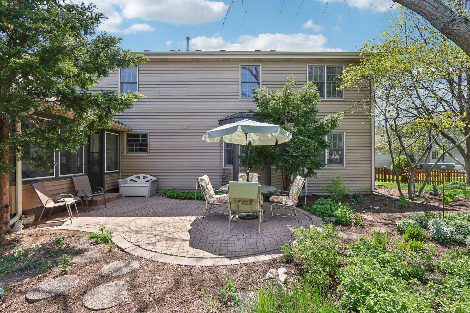 2835 Randall Ridge Court Elgin, IL 60124 - Photo 31 of 39 a view of a house with backyard sitting area and garden