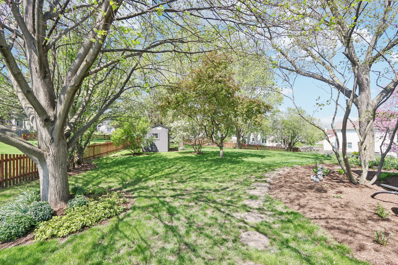 2835 Randall Ridge Court Elgin, IL 60124 - Photo 37 of 39 a view of backyard with tree