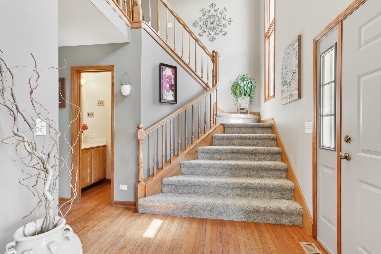 2835 Randall Ridge Court Elgin, IL 60124 - Photo 4 of 39 a view of entryway with wooden floor and stairs