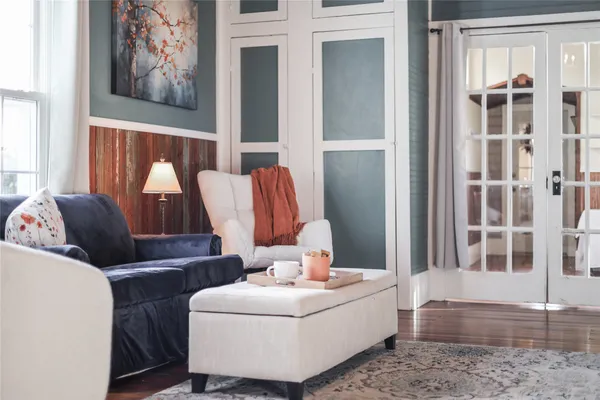 a living room with large windows