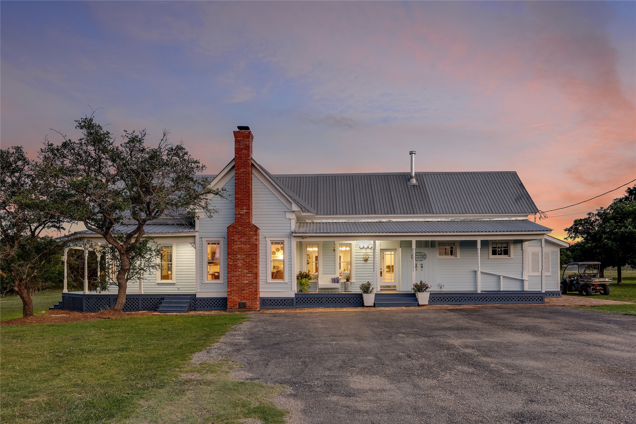 13471 Cedar Valley Road Salado, TX 76571 - Photo 2 of 39 a front view of a house with a yard and garage