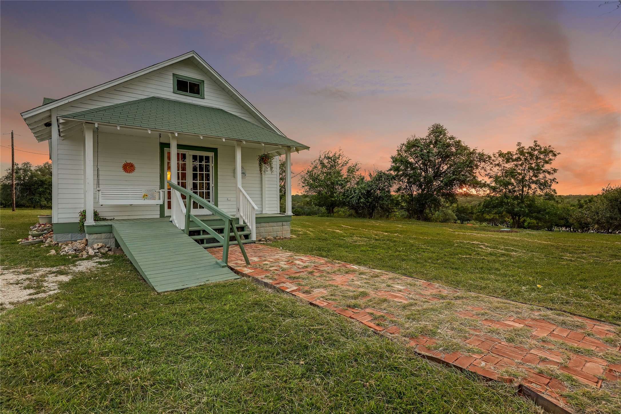 13471 Cedar Valley Road Salado, TX 76571 - Photo 28 of 39 a view of a house with a yard