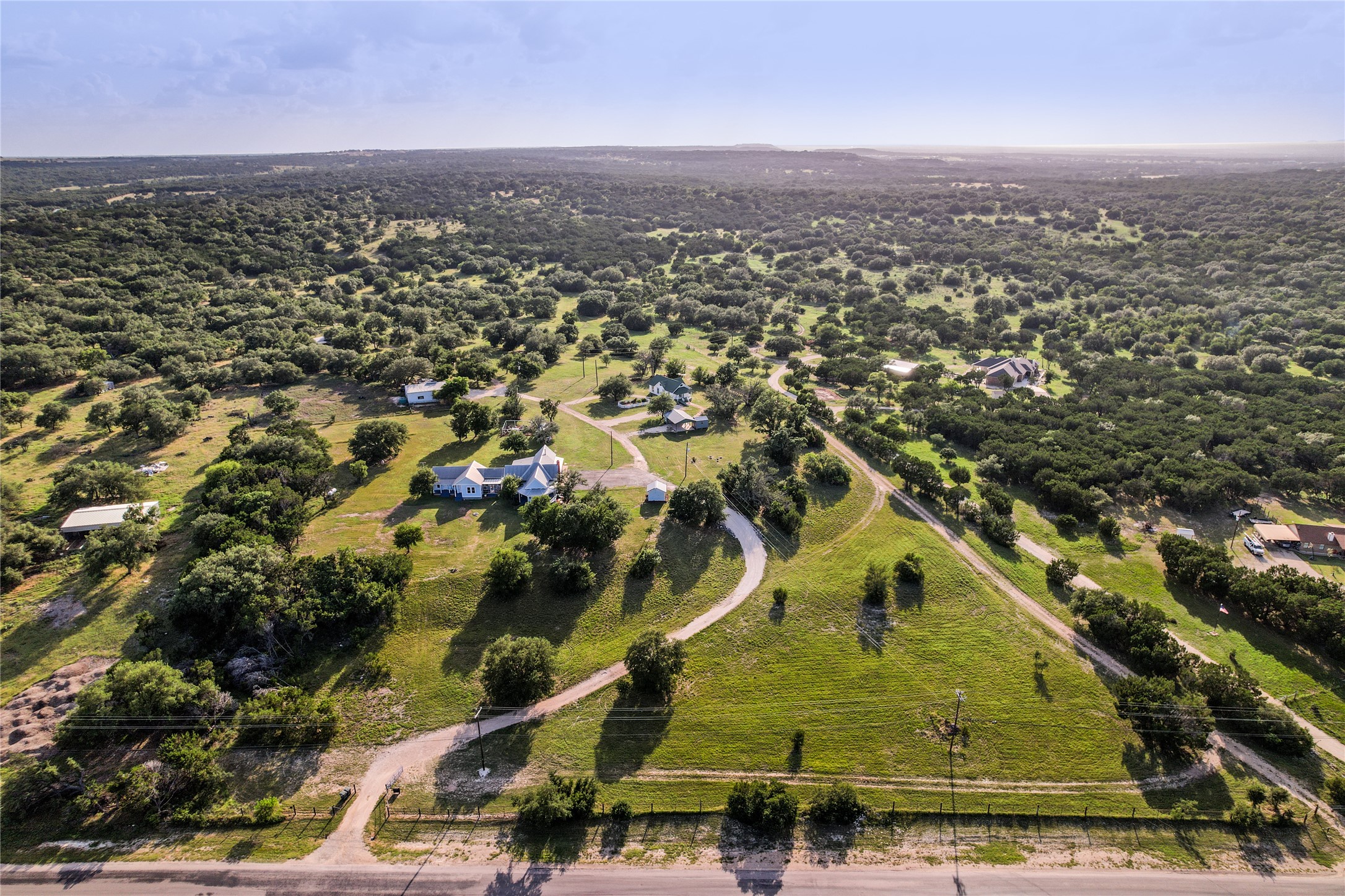 13471 Cedar Valley Road Salado, TX 76571 - Photo 37 of 39 an aerial view of residential houses with outdoor space