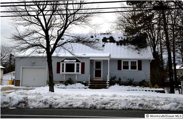 955 Hyson Road Jackson, NJ 08527 - Photo 1 of 15 a view of a house with snow on the side of the road