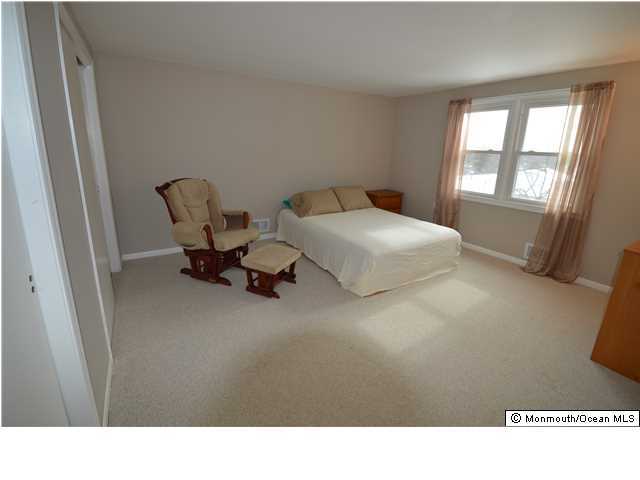 955 Hyson Road Jackson, NJ 08527 - Photo 11 of 15 a living room with furniture and a window