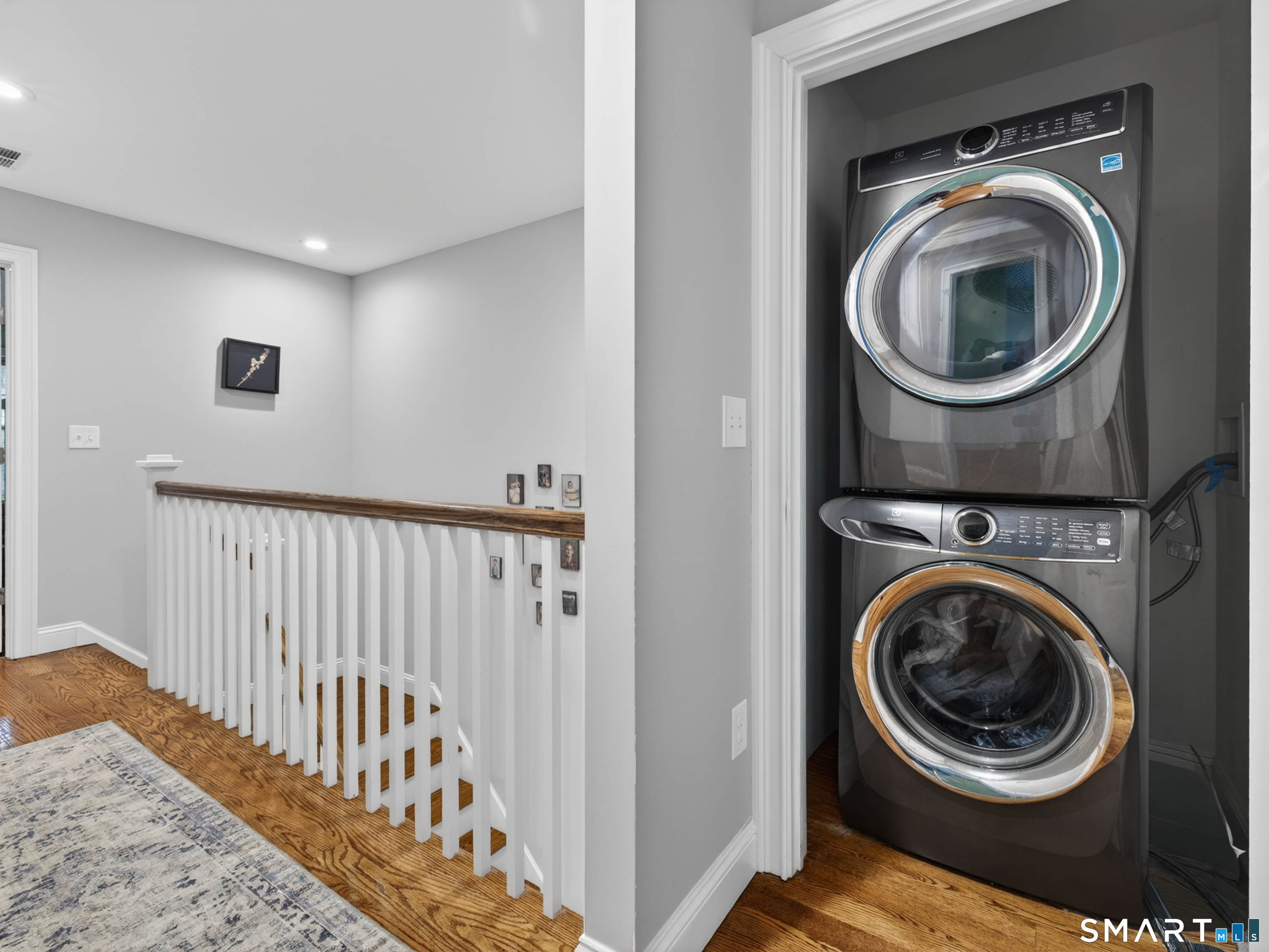 34 Village Crossing, Unit 34 Niantic, CT 06357 - Photo 31 of 38 a view of a hallway with washer and dryer