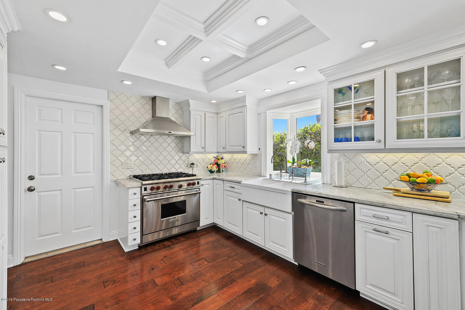 1412 Hillside Drive Glendale, CA 91208 - Photo 14 of 33 a kitchen with stainless steel appliances granite countertop a stove and a sink