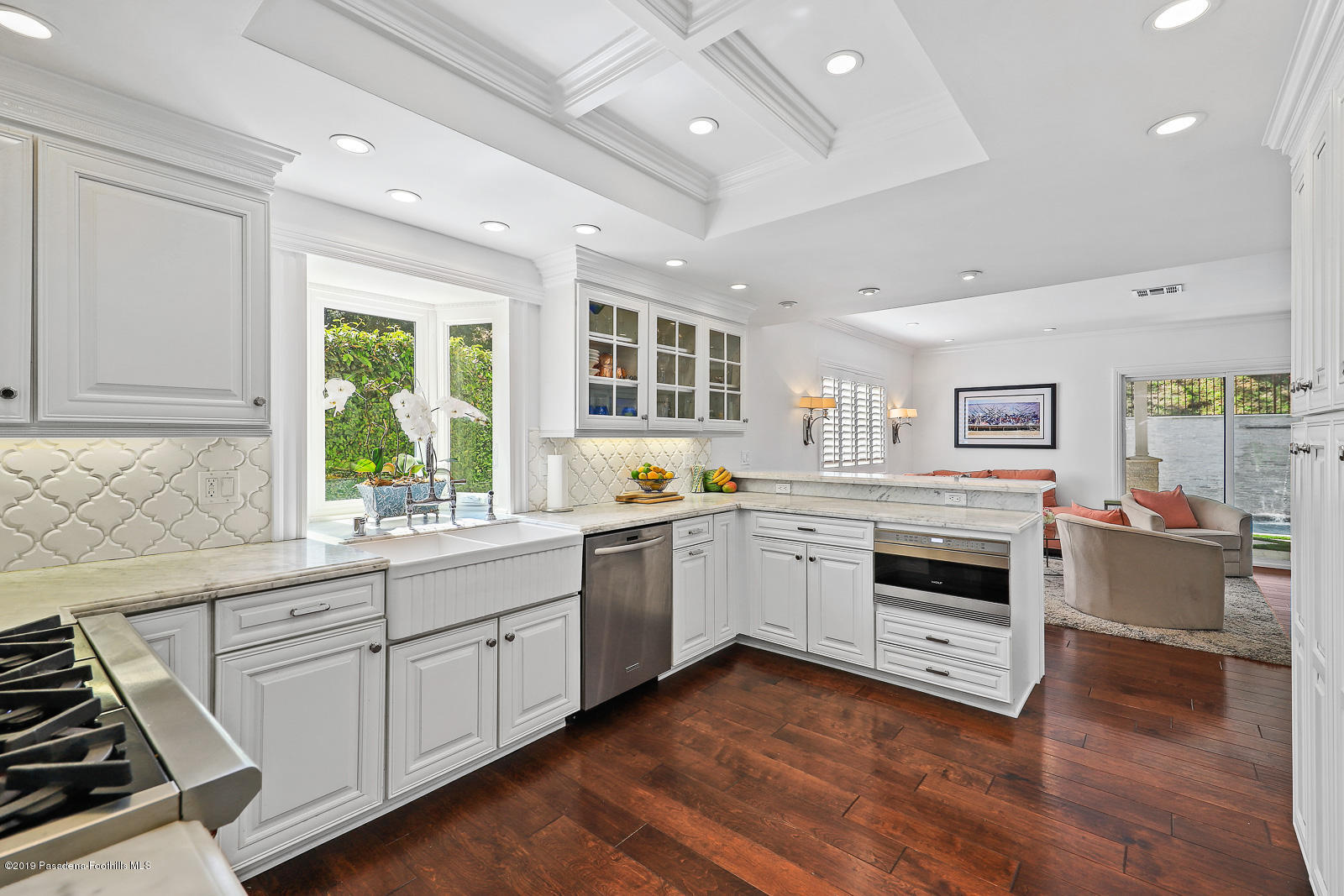 1412 Hillside Drive Glendale, CA 91208 - Photo 15 of 33 a kitchen with granite countertop white cabinets and white appliances