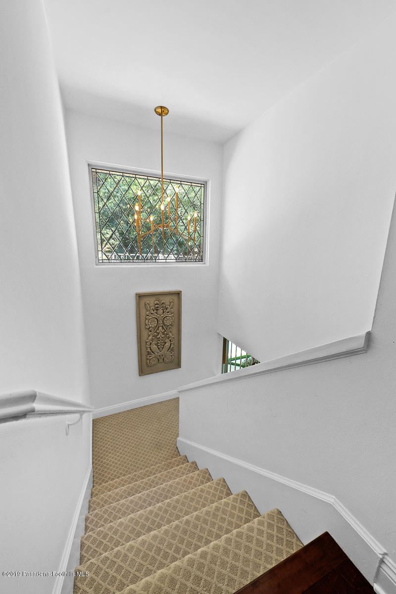 1412 Hillside Drive Glendale, CA 91208 - Photo 17 of 33 a bedroom with a bed and a window