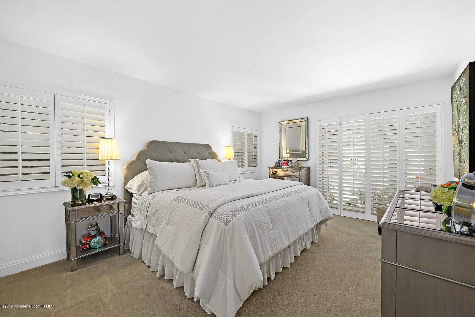 1412 Hillside Drive Glendale, CA 91208 - Photo 18 of 33 a bedroom with a bed a couch and potted plant on the dresser