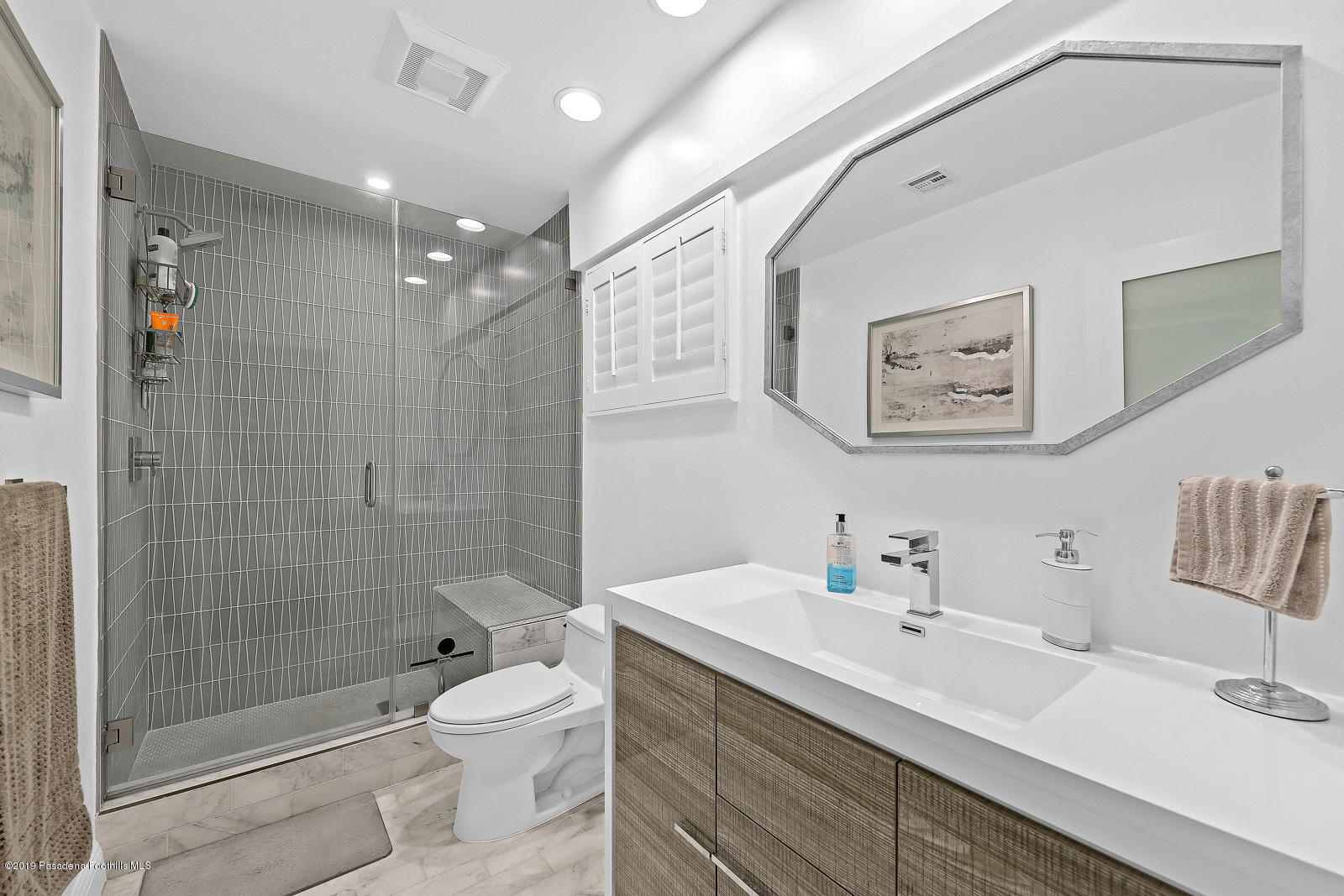 1412 Hillside Drive Glendale, CA 91208 - Photo 20 of 33 a bathroom with a sink a toilet and shower