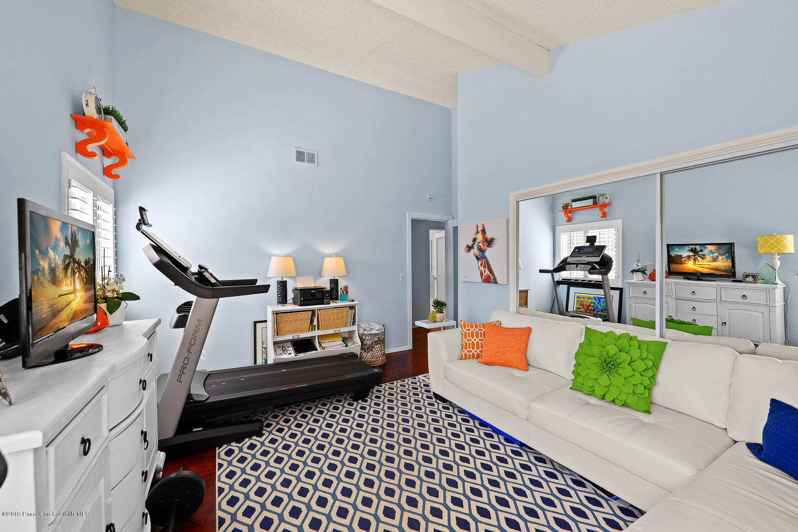 1412 Hillside Drive Glendale, CA 91208 - Photo 23 of 33 a living room with furniture and a flat screen tv