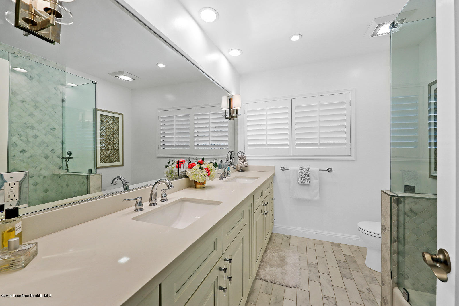 1412 Hillside Drive Glendale, CA 91208 - Photo 25 of 33 a bathroom with a sink double vanity and a mirror