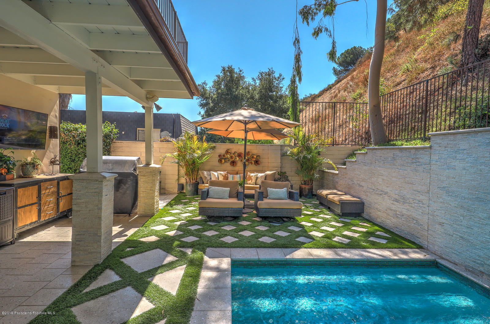 1412 Hillside Drive Glendale, CA 91208 - Photo 33 of 33 a view of a backyard with a patio and outdoor seating