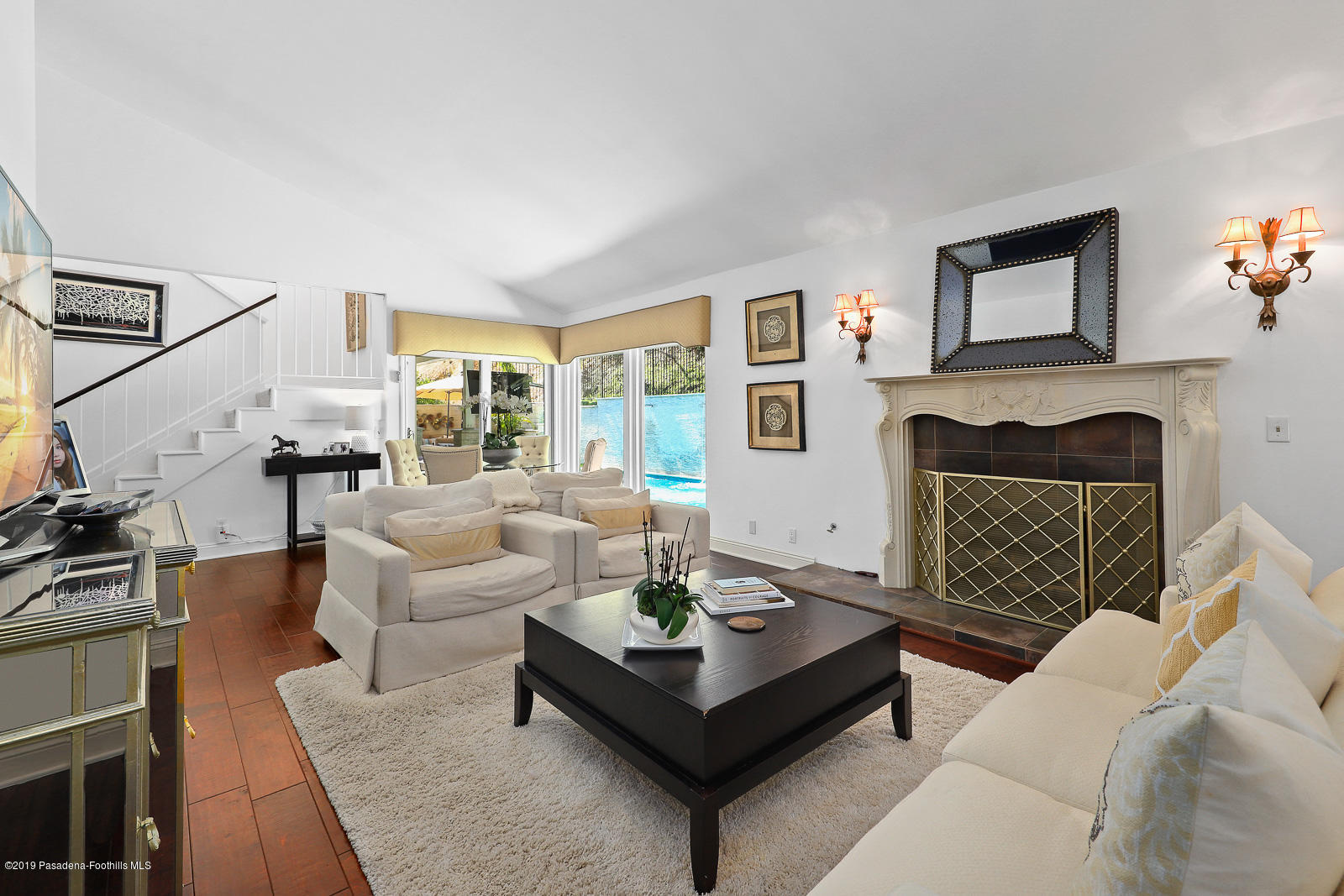 1412 Hillside Drive Glendale, CA 91208 - Photo 7 of 33 a living room with furniture and a fireplace