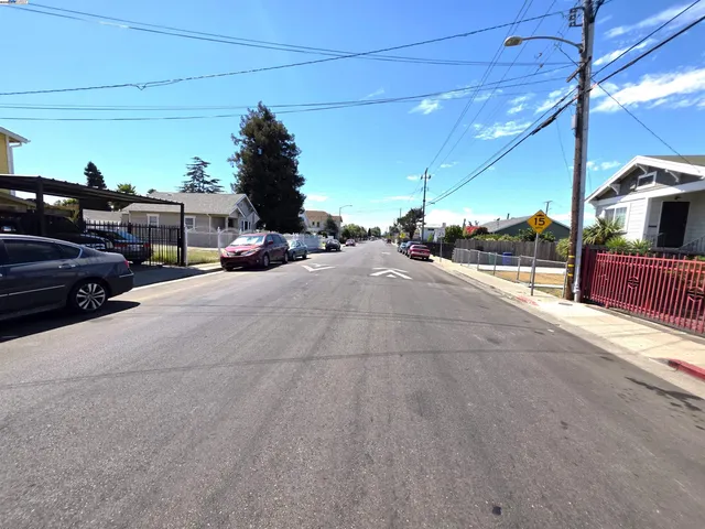 an aerial view of a house with a swimming pool