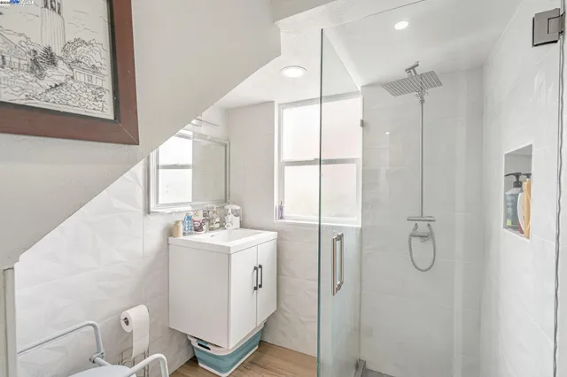 a view of dining room with furniture and wooden floor