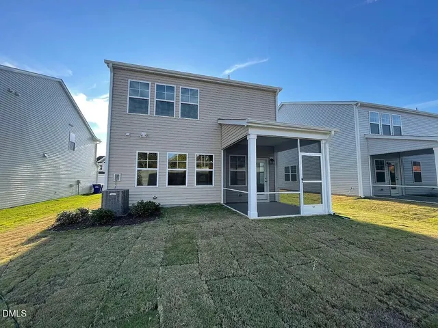 a view of a house with a swimming pool