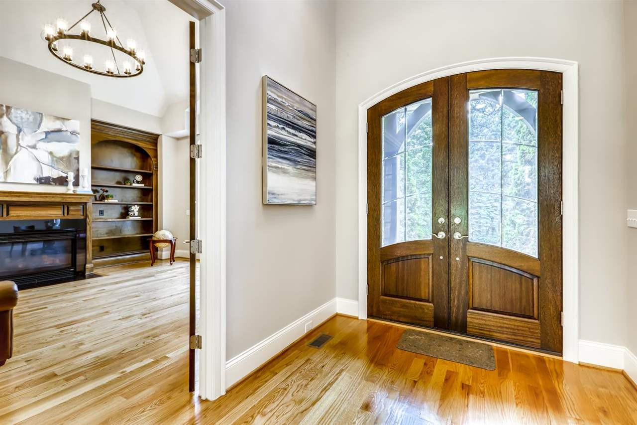 1408 Caistor Lane Raleigh, NC 27614 - Photo 3 of 18 GLEAMING HARDWOODS throughout other than NEW CARPET in the FIRST FLOOR Bedroom, upstairs hallway and BONUS. Freshly painted interior and window SHUTTERS, are other great features. Foyer