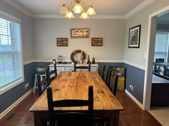 a room with furniture and a window