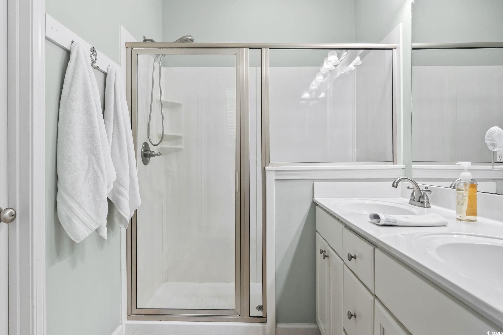 173 Foxpath Loop Myrtle Beach, SC 29588 - Photo 15 of 31 Full bath featuring a shower stall and double vanity