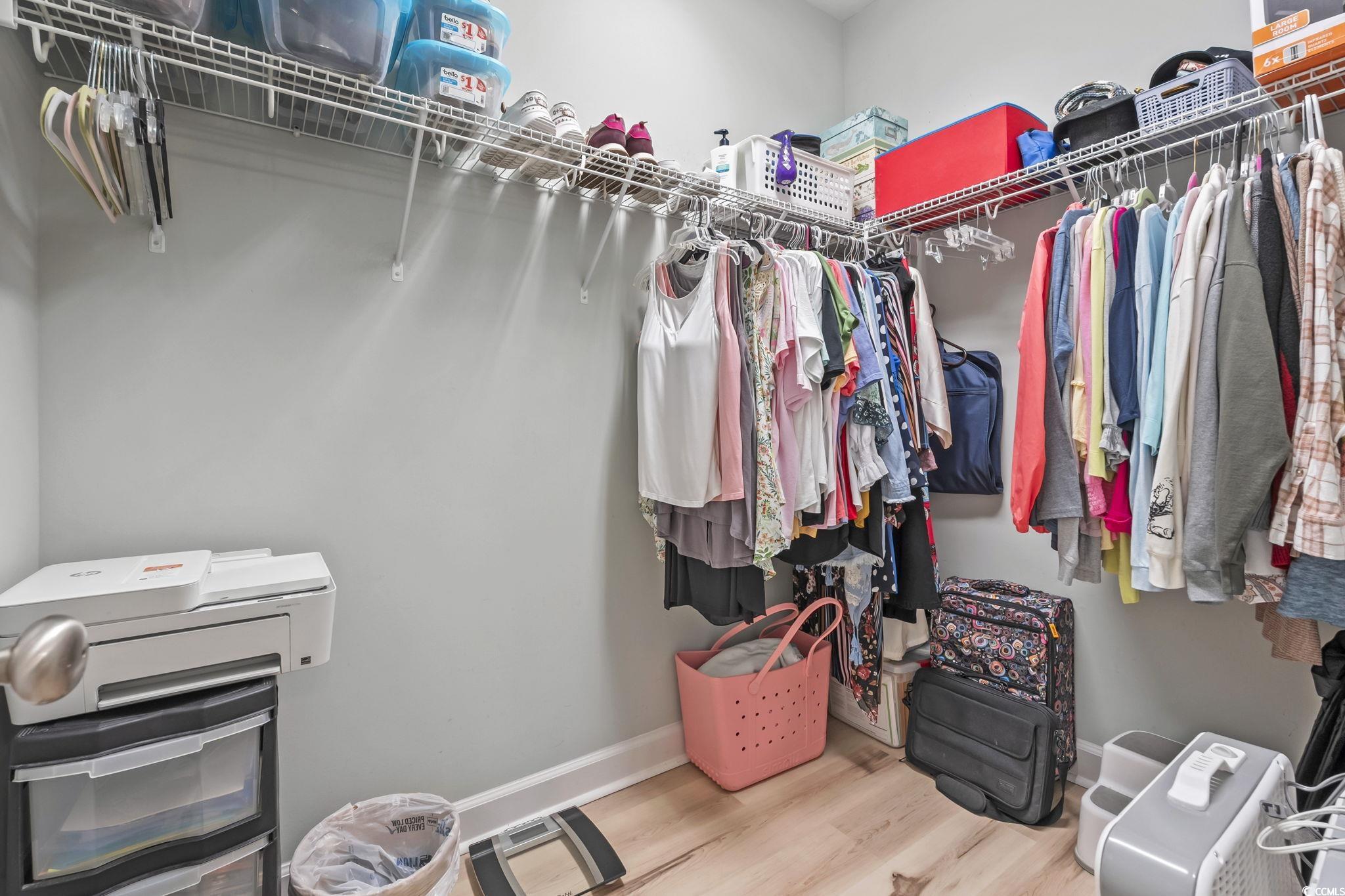173 Foxpath Loop Myrtle Beach, SC 29588 - Photo 16 of 31 Walk in closet featuring wood finished floors