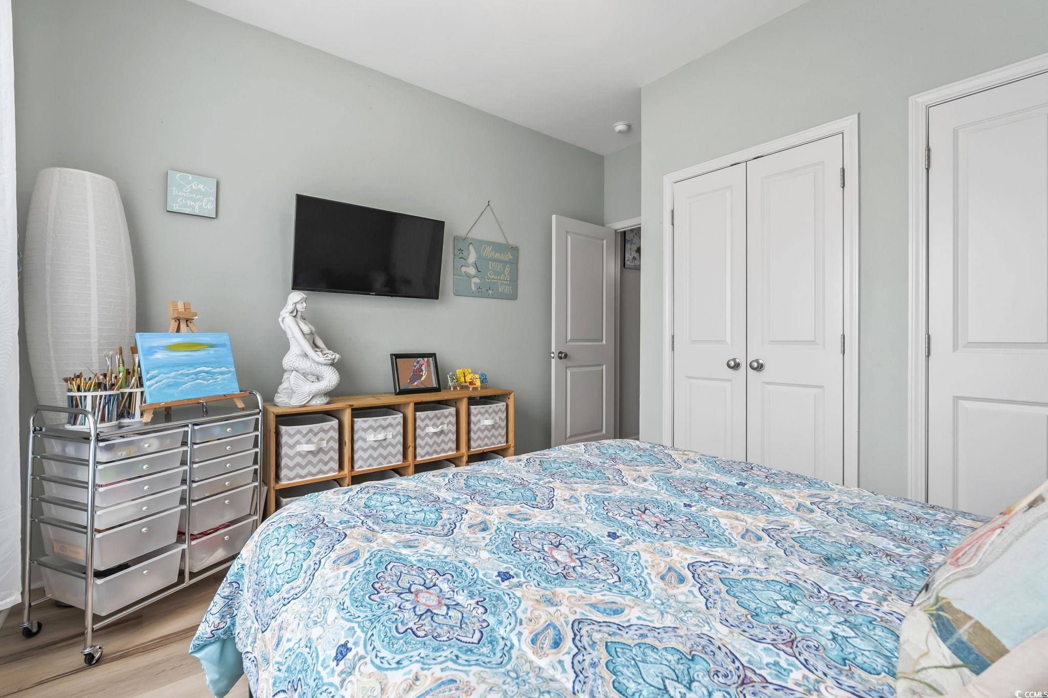 173 Foxpath Loop Myrtle Beach, SC 29588 - Photo 19 of 31 Bedroom with wood finished floors