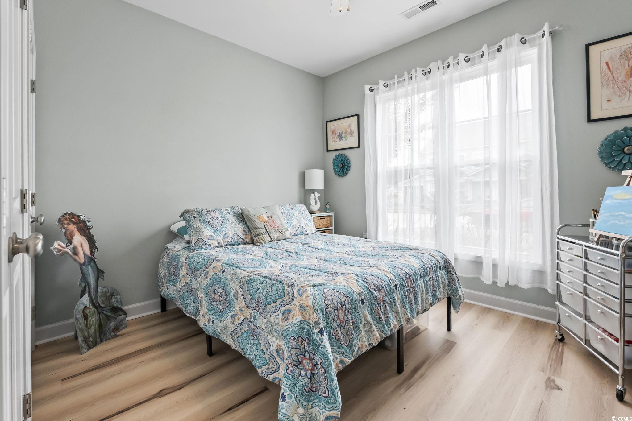 173 Foxpath Loop Myrtle Beach, SC 29588 - Photo 20 of 31 Bedroom featuring light wood-style flooring