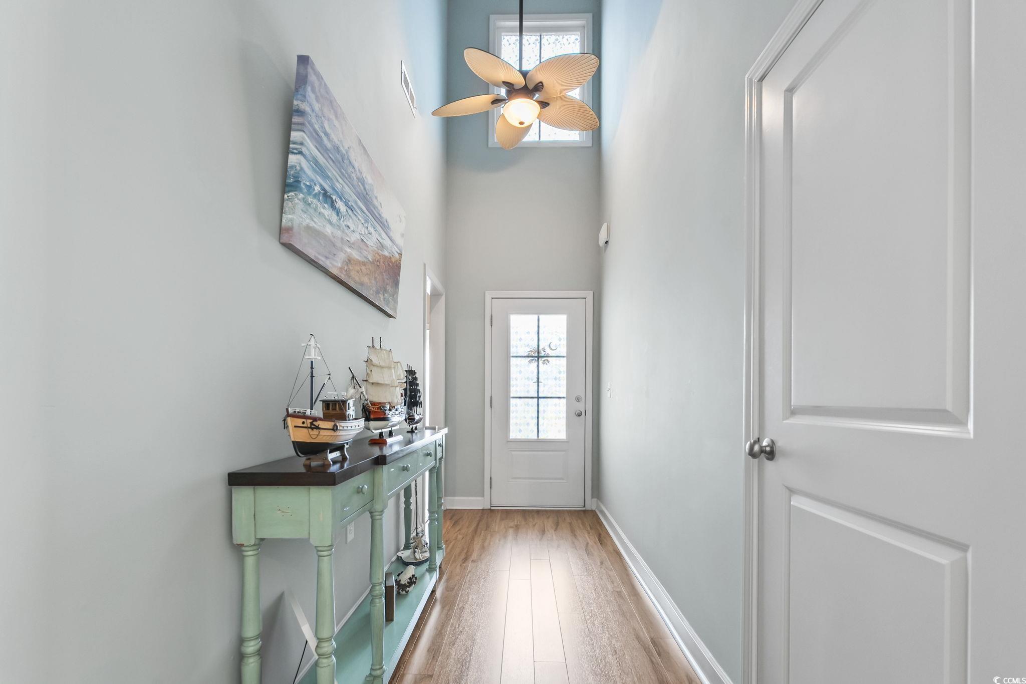 173 Foxpath Loop Myrtle Beach, SC 29588 - Photo 2 of 31 Entryway with a high ceiling, wood finished floors, and a ceiling fan