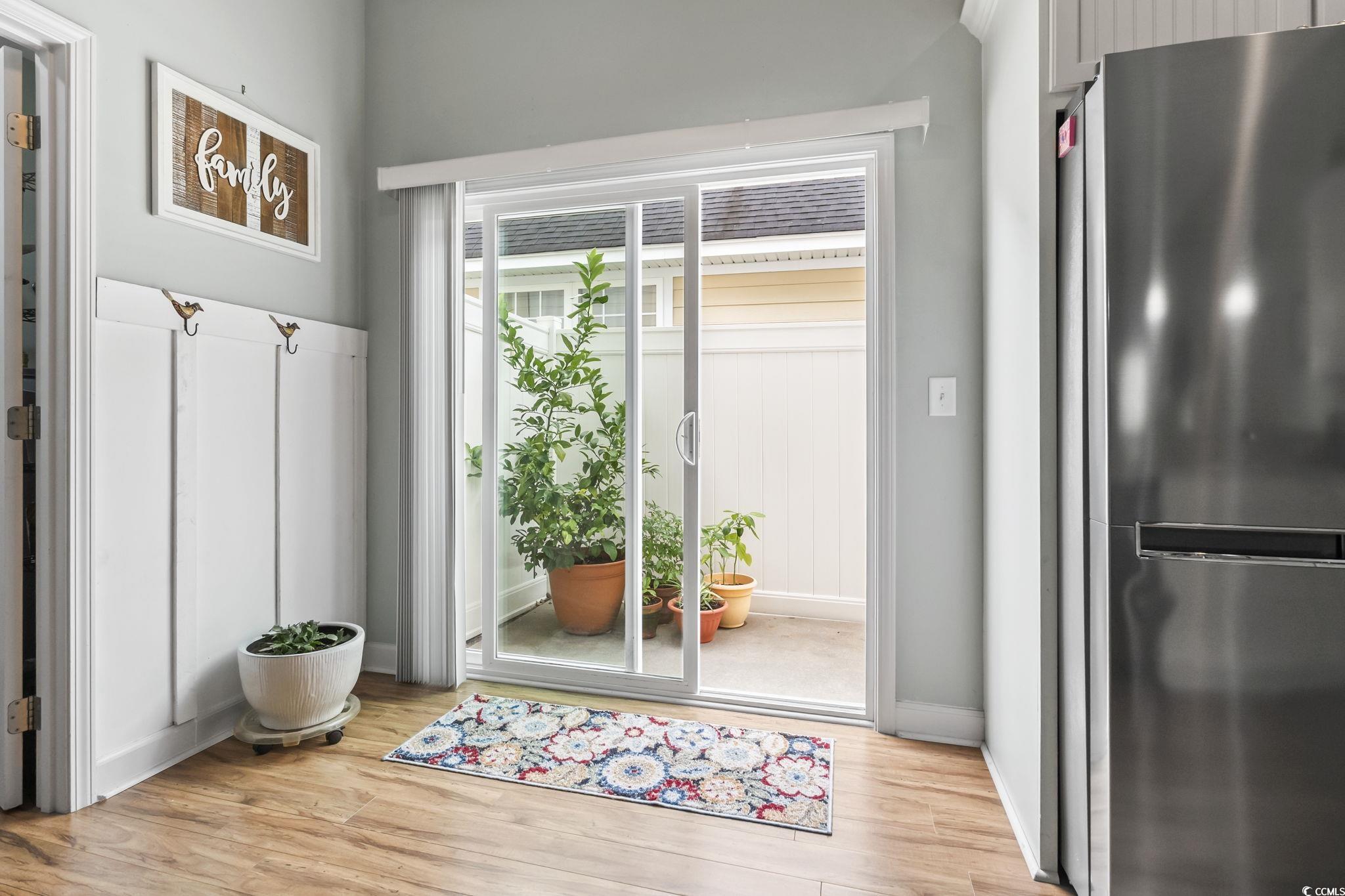 173 Foxpath Loop Myrtle Beach, SC 29588 - Photo 6 of 31 Doorway featuring wood finished floors