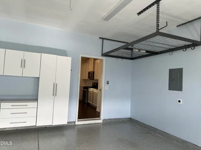 a view of a storage & utility room with closet