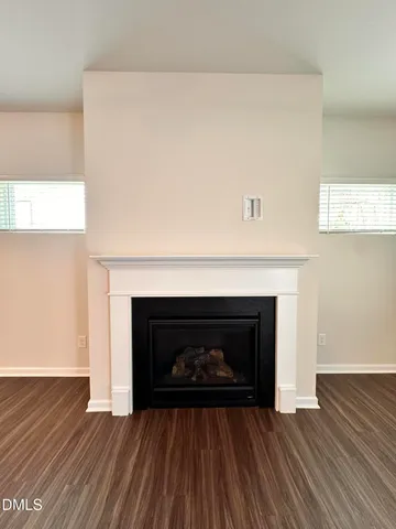 a living room with a fireplace