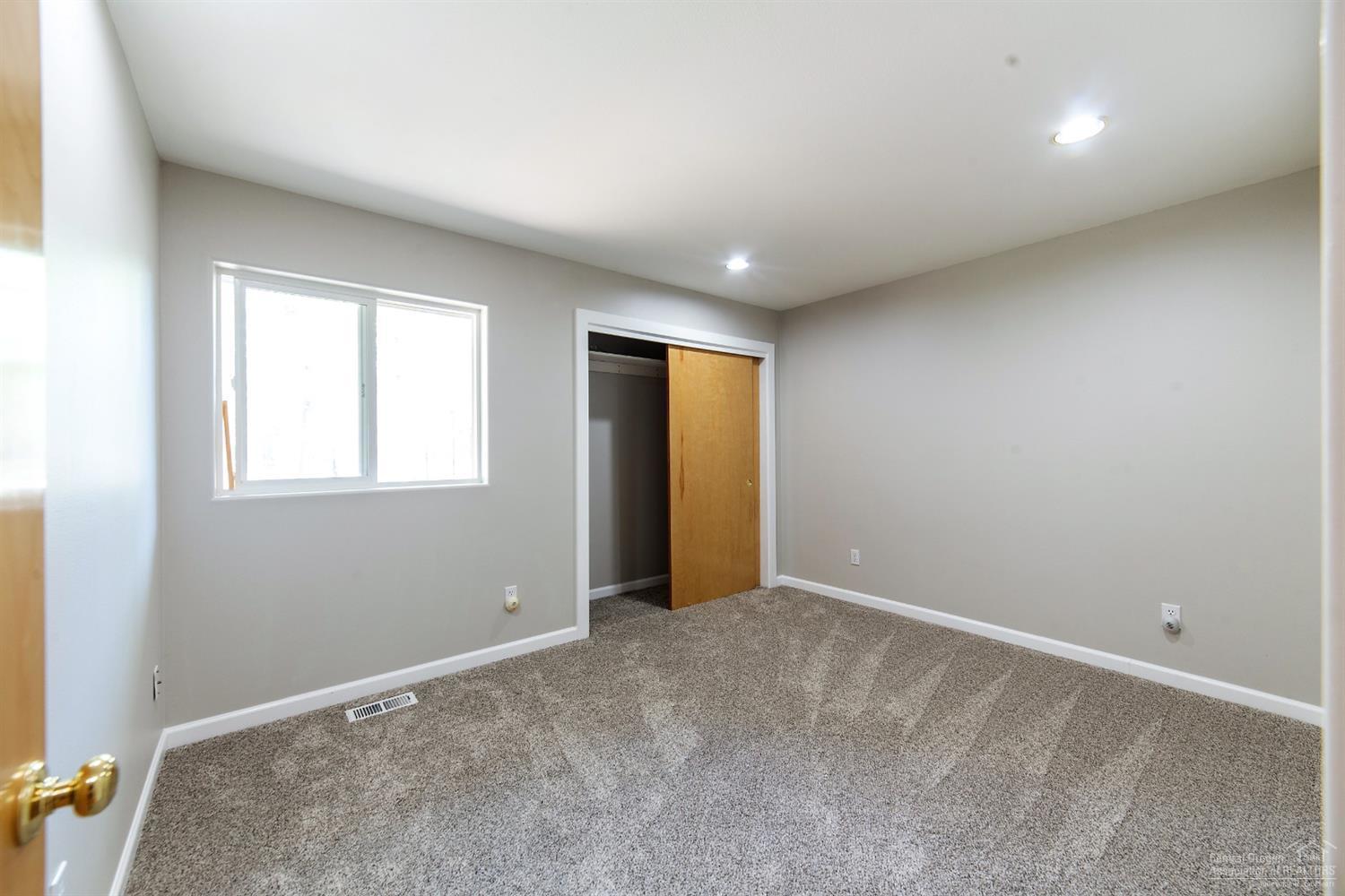 17325 Covina Road Bend, OR 97707 - Photo 15 of 25 Birch closet doors and good lighting in