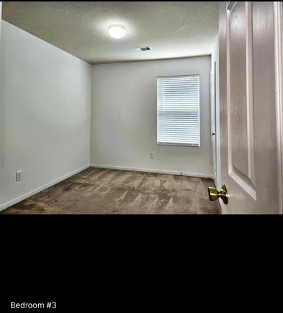 a bathroom with a sink a mirror and a shower