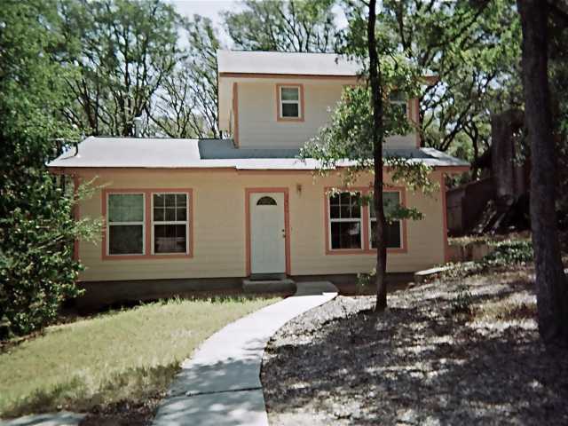 2411 Ware Road Austin, TX 78741 - Photo 1 of 1 a front view of a house with a yard