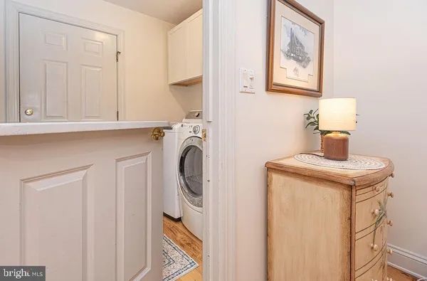 a spacious bedroom with a bed and a couch