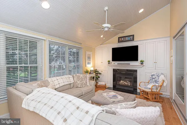a living room with furniture and a table